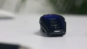 a close up of a cell phone on a table