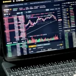 black laptop computer turned on displaying game application