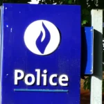 blue and white no smoking sign