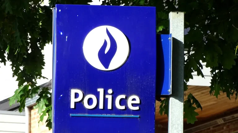 blue and white no smoking sign