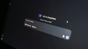 Close-up of DeepSeek AI chat interface on a laptop screen in low light.