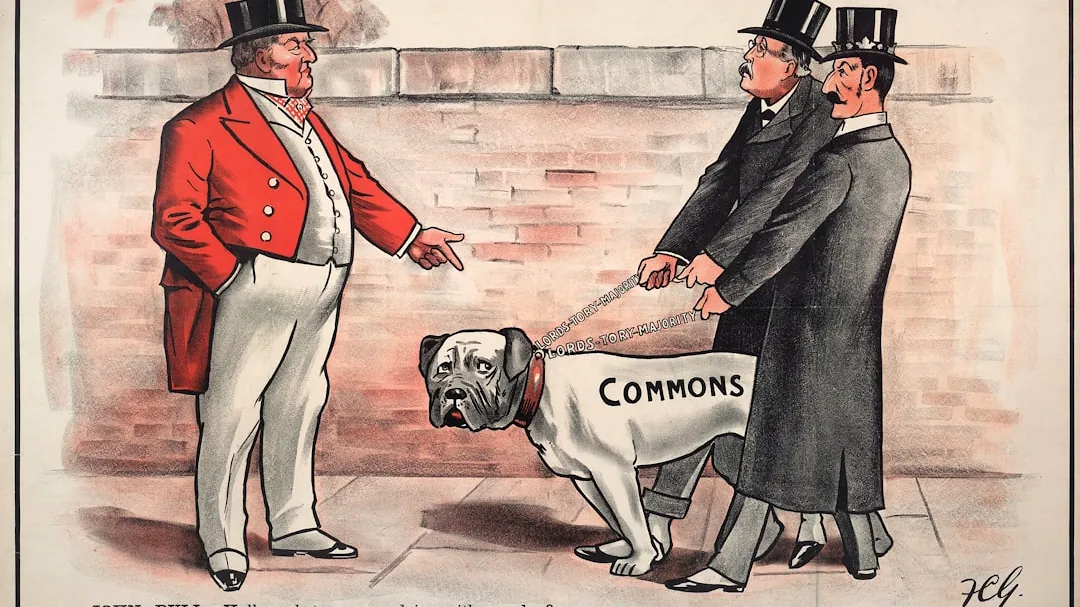 man in black suit holding a woman in red blazer