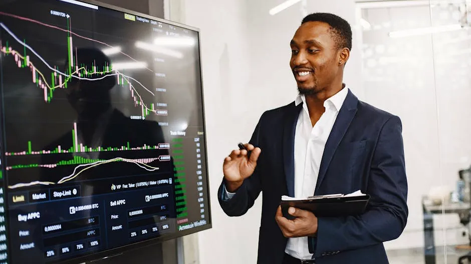 Professional man presenting financial data on a digital screen in modern office.