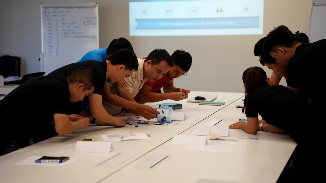 Team collaborating on a project at a table.